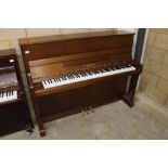 Yamaha (c1992)  A Model P116N upright piano in a bright mahogany case; together with a matching