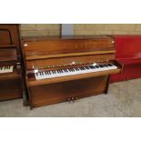 Blüthner (c1986) A Model M upright piano in a modern style bright mahogany case.