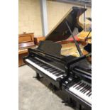 Yamaha (c1992) A 6ft 1in Model C3 grand piano in a bright ebonised case on square tapered legs, on