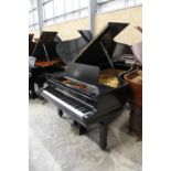 Steinway (c1940) A 6ft 11in Model B grand piano in an ebonised case on square tapered legs; together