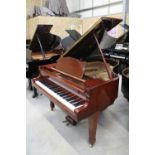 Yamaha (c1970) A 6ft 1in Model C3 grand piano in a bright mahogany case on square tapered legs;