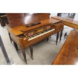 John Broadwood and Sons An early 19th century square piano in a crossbanded mahogany case.
