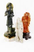 A Chinese carved soapstone figure of Shoulao, the Chinese god of longevity, on carved plinth,