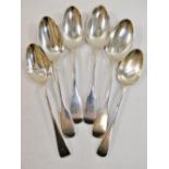 A pair of Victorian silver fiddle pattern dessert spoons and two other matched spoons all with