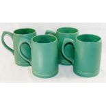 A set of four green glazed Wedgwood tankards by Keith Murray, 2.