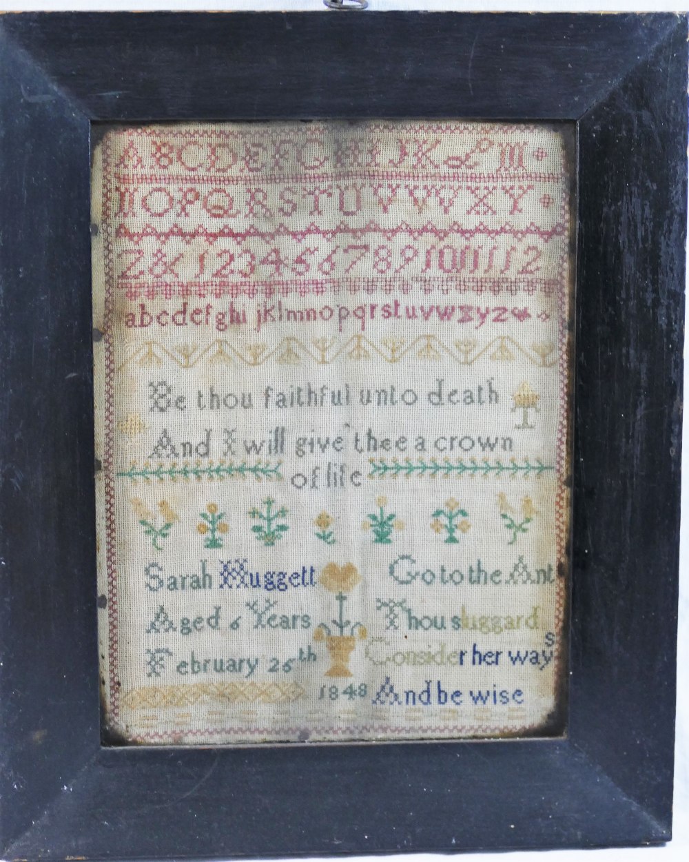 An early Victorian sampler, by Sarah Huggett, aged 6 years, February 26th 1848, with alphabet,