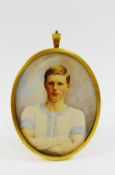 A late Victorian oval portrait miniature on ivory of a young man in a Cambridge University athletic