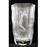 An Orrefors clear glass vase by Edvin Ohrstrom, with panelled and wavy sides,