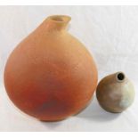 Andy Phillips (20th/21st Century British)+ A smoke fired pottery vessel with textured finish,