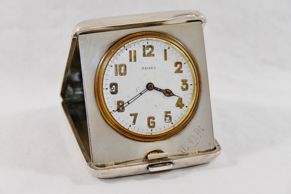 A silver cased folding bedside clock, with eight day movement, Birmingham 1925 by Adie Bros Ltd,