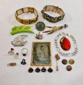 A collection of mainly costume jewellery including a Scottish silver mounted bird claw cloak brooch,