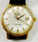 A 1960's yellow metal cased gentleman's Omega Automatic Seamaster wrist watch,