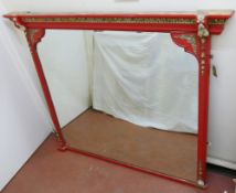 A large 19th century rectangular overmantle mirror with red, cream and gilt painted frame,