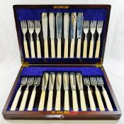 A set of ivory handled silver fish knives and forks for 12 place settings, London 1939, knives 20.