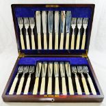 A set of ivory handled silver fish knives and forks for 12 place settings, London 1939, knives 20.