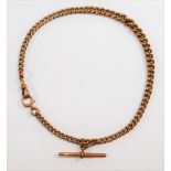 A Victorian 9 carat rose gold watch chain, with 'T' bar,