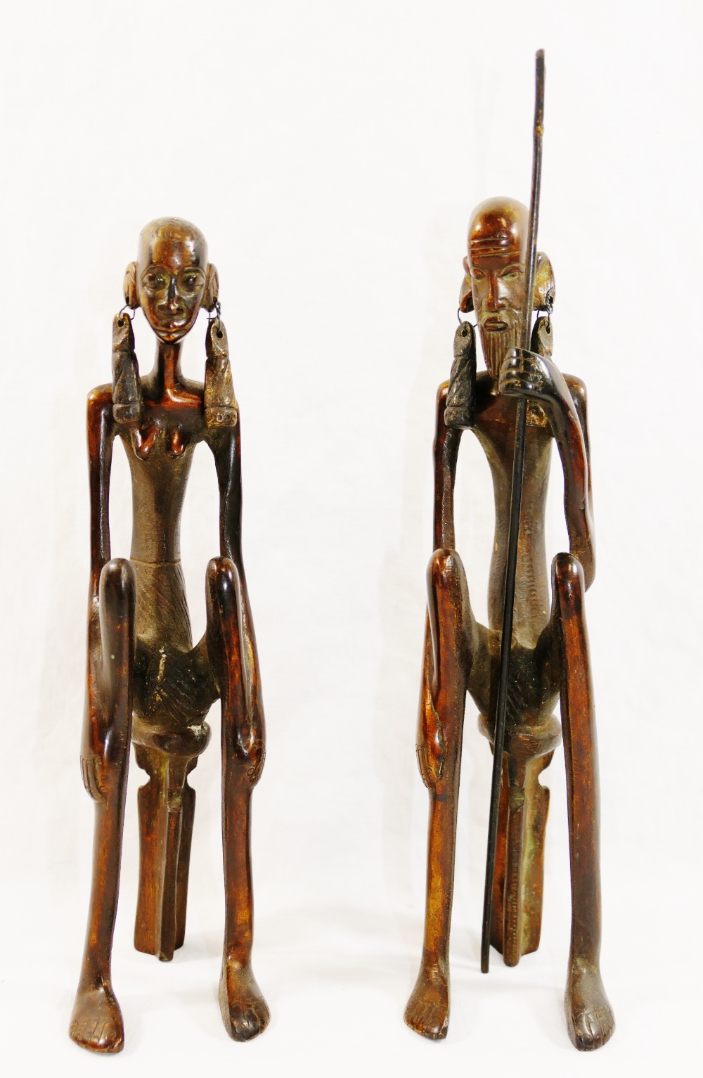 A pair of 20th century bronze Lobi style figures of a West African tribal couple,