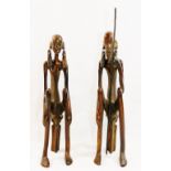 A pair of 20th century bronze Lobi style figures of a West African tribal couple,