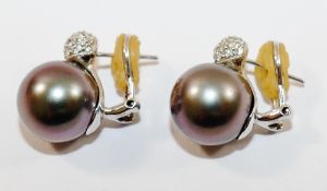 A pair of WCJ International South Sea pearl and diamond earrings,