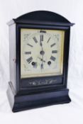 A Winterhalder Hofmeier mantle clock, the white enamel dial with subsidary dial,