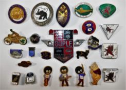 A collection of 24 enamelled and other pins and badges including motorcycle racing interest,