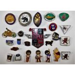 A collection of 24 enamelled and other pins and badges including motorcycle racing interest,