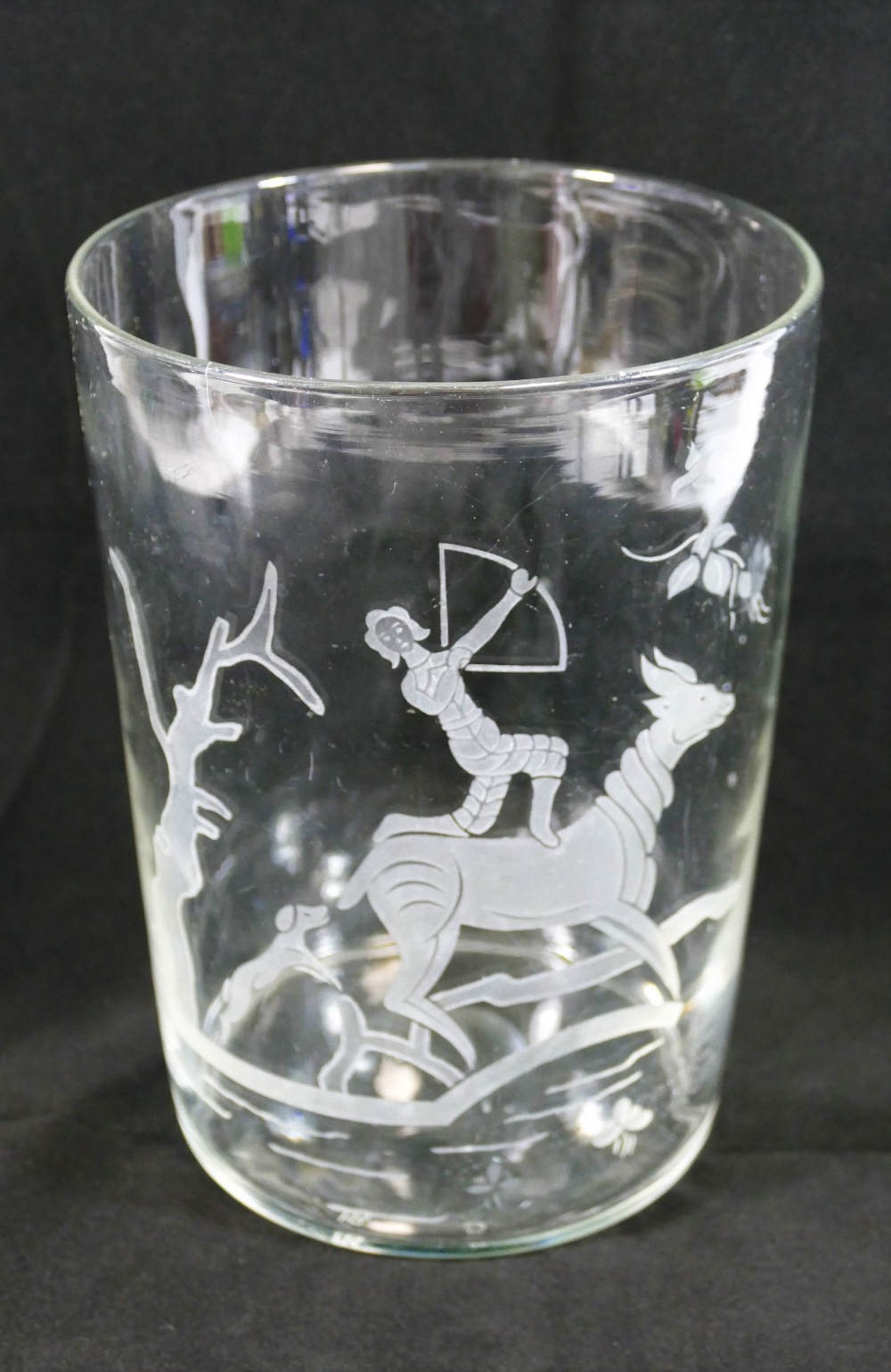 A large hand blown straight sided vase, with engraved design of an archer on horseback,