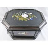 A 19th century Italian pietra dura casket, the nine hard stone set floral panels depicting roses,