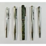 A Valentine fountain pen with 14ct gold nib, two silver propelling pencils,