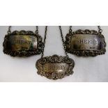 A pair of silver decanter labels, Birmingham 1981, engraved 'Whisky' and 'Sherry',