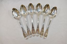 A set of six Victorian silver reeded pattern table spoons with scroll cartouche terminals,