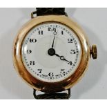 A 9 carat gold cased ladies Buren wrist watch, London 1928, the white dial with Arabic numerals,