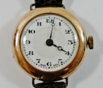 A 9 carat gold cased ladies Buren wrist watch, London 1928, the white dial with Arabic numerals,