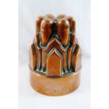 A Victorian castellated copper jelly mould, stamped with maker's mark 'R&B' to the rim, 14.