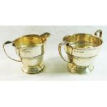 A George VI silver milk jug and two-handled sugar bowl, Birmingham 1947, by Elkington and Co.