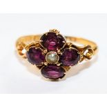 A Victorian 15 carat gold amethyst and seed pearl flower head ring, Birmingham 1862, 1.