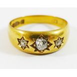 A Victorian 18 carat gold gypsy set diamond three stone ring, Chester 1894,