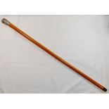 A Chinese malacca cane with silver coloured metal top,