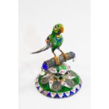 An Indian silver and polychrome enamel ornament in the form of a parrot on a perch, 6.