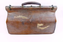 Three items of vintage leather luggage comprised of a Gladstone bag,