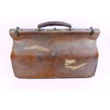 Three items of vintage leather luggage comprised of a Gladstone bag,