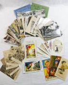 A collection of approximately 90 early 20th century and later postcards including a first edition