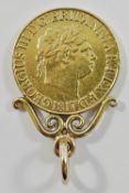 A George III 1817 sovereign with scrolling pendant mount, combined weight 9.