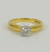 An 18 carat gold and platinum diamond single stone ring,