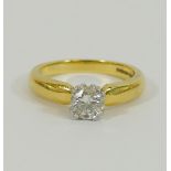 An 18 carat gold and platinum diamond single stone ring,