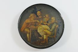 A late 18th century German papier mache circular snuff box,