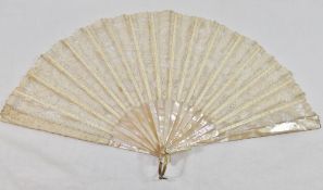 A 19th century lace fan, with mother of pearl and bone sticks and guards, 40cm wide, 22cm long,