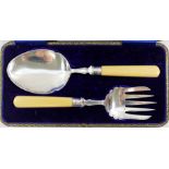 A George V silver and ivorine handled serving spoon and fork, Sheffield 1912,