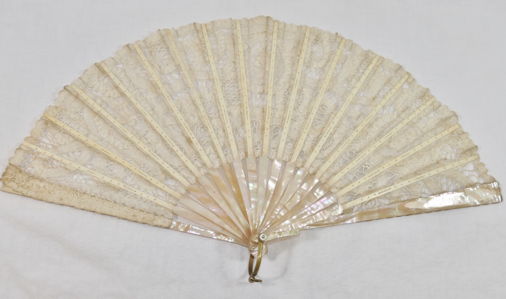 A 19th century lace fan, with mother of