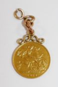 A George V half sovereign, 1913, converted to a pendant, 4.